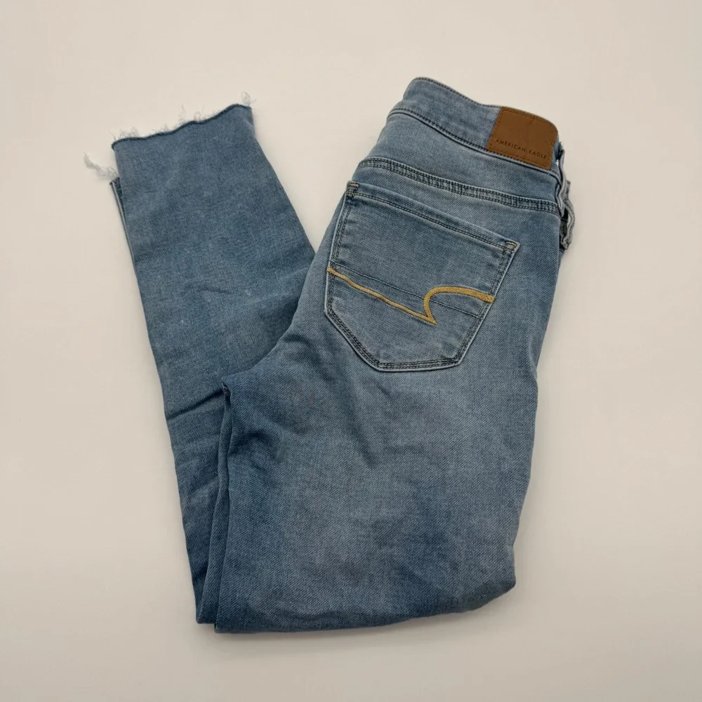 American Eagle‎ Super Stretch Jegging Light Wash Raw Hem Jeans Women Size 4